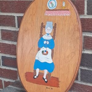 Handcrafted Oval Wall Art with Blue Accents